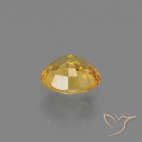 Zafiro Dorado natural de 0.73 ct, Ovalada, VS