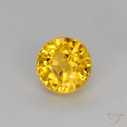 Zafiro Dorado natural de 0.73 ct, Redondo, VS