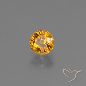 Zafiro Dorado naranja oscuro natural de 0.74 ct, Redondo, VS