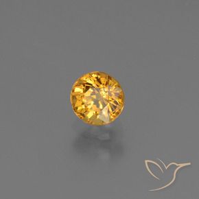 Zafiro Dorado naranja oscuro natural de 0.70 ct, Redondo, VS