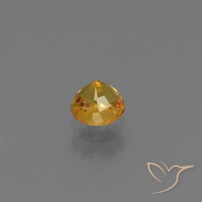 Zafiro Dorado naranja oscuro natural de 0.70 ct, Redondo, VS