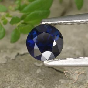 Zafiro Azul oscuro natural de 0.56 ct, Redondo, VS