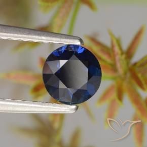 Zafiro Azul oscuro natural de 0.59 ct, Redondo, VVS