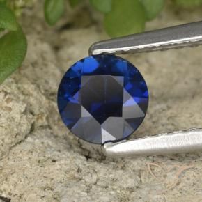 Zafiro Azul oscuro natural de 0.63 ct, Redondo, VVS