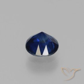 Zafiro Azul oscuro natural de 0.78 ct, Redondo, VVS