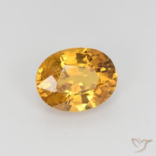 Zafiro Dorado naranja oscuro natural de 1.53 ct, Ovalada, VS