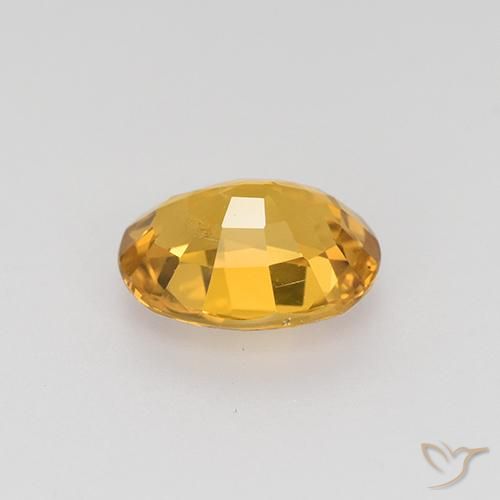 Zafiro Dorado naranja oscuro natural de 1.53 ct, Ovalada, VS