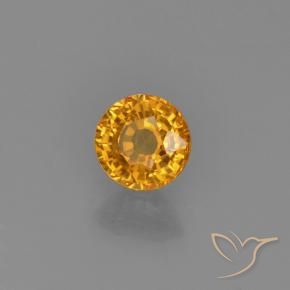 Zafiro Dorado naranja oscuro natural de 0.59 ct, Redondo, VVS