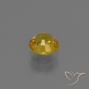 Zafiro Dorado natural de 0.67 ct, Redondo, VVS