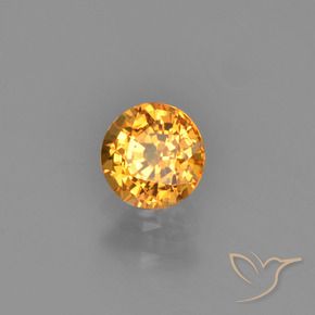 Zafiro Naranja intenso natural de 0.67 ct, Redondo, VVS