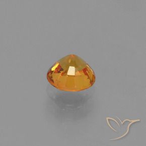 Zafiro Naranja intenso natural de 0.67 ct, Redondo, VVS