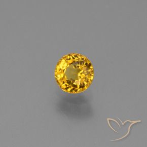 Zafiro Dorado medio natural de 0.68 ct, Redondo, VVS-VS