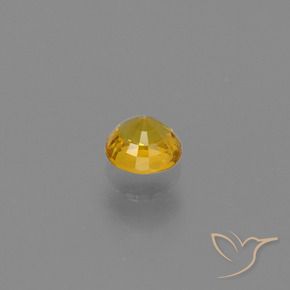 Zafiro Dorado medio natural de 0.68 ct, Redondo, VVS-VS