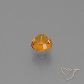 Zafiro Naranja intenso natural de 0.67 ct, Redondo, VVS-VS