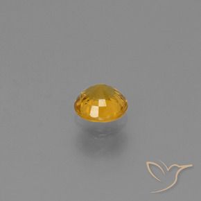 Zafiro Dorado naranja natural de 0.61 ct, Redondo, VVS-VS
