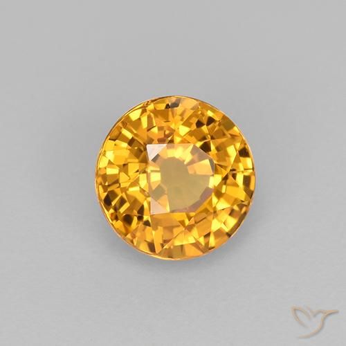 Zafiro Naranja dorado intenso natural de 0.83 ct, Redondo, VVS-VS