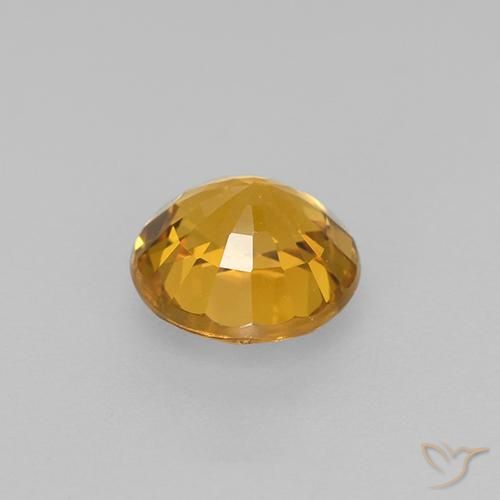 Zafiro Naranja dorado intenso natural de 0.83 ct, Redondo, VVS-VS