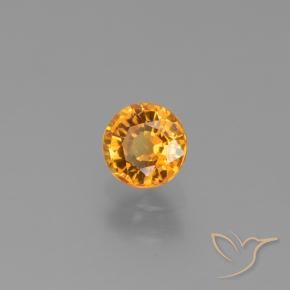 Zafiro Dorado naranja intenso natural de 0.90 ct, Redondo, VVS-VS