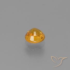 Zafiro Dorado naranja intenso natural de 0.90 ct, Redondo, VVS-VS