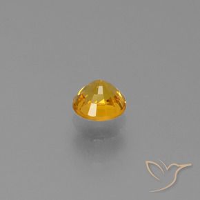 Zafiro Dorado naranja oscuro natural de 0.72 ct, Redondo, VVS-VS