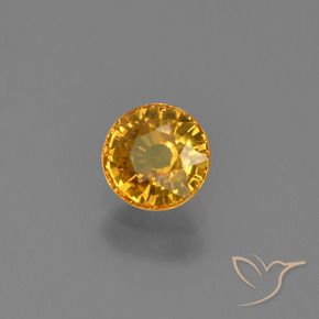 Zafiro Naranja dorado intenso natural de 0.70 ct, Redondo, VVS-VS