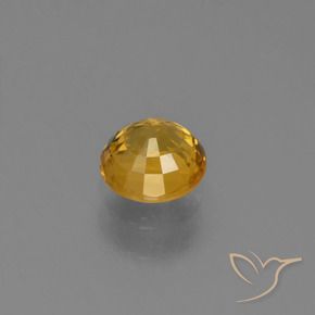 Zafiro Naranja dorado intenso natural de 0.70 ct, Redondo, VVS-VS
