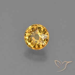 Zafiro Naranja dorado intenso natural de 0.62 ct, Redondo, VVS-VS