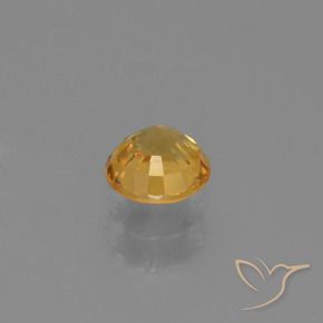 Zafiro Naranja dorado intenso natural de 0.62 ct, Redondo, VVS-VS