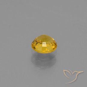 Zafiro Naranja dorado natural de 0.62 ct, Redondo, VVS-VS