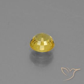 Zafiro Dorado amarillento natural de 0.63 ct, Redondo, VVS-VS