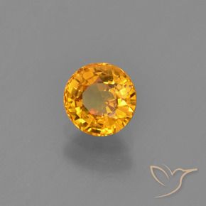 Zafiro Naranja dorado intenso natural de 0.76 ct, Redondo, VVS