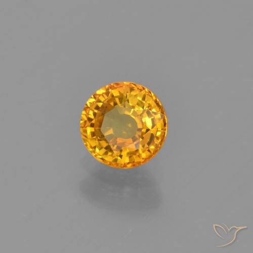 Zafiro Naranja dorado intenso natural de 0.66 ct, Redondo, VVS-VS