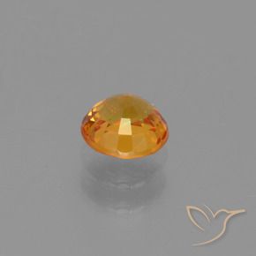 Zafiro Naranja medio natural de 0.71 ct, Redondo, VS