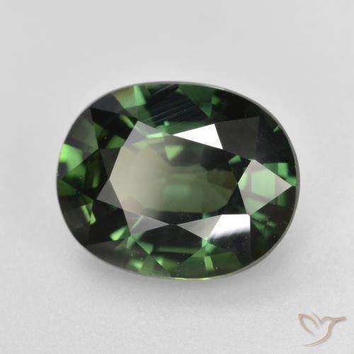 Zafiro Verde oscuro natural de 4.74 ct, Ovalada, VVS-VS