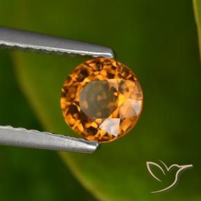 Zafiro Naranja oscuro medio natural de 0.88 ct, Redondo, VVS-VS