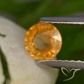 Zafiro Dorado naranja intenso natural de 0.58 ct, Redondo, VS