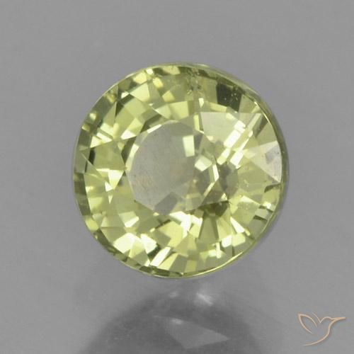 Zafiro Amarillo verdoso natural de 0.84 ct, Redondo, VS