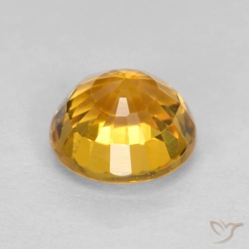 Zafiro Naranja medio natural de 0.75 ct, Redondo, VS