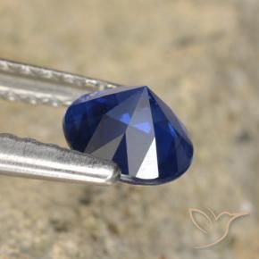 Zafiro Azul oscuro natural de 0.61 ct, Redondo, VVS-VS