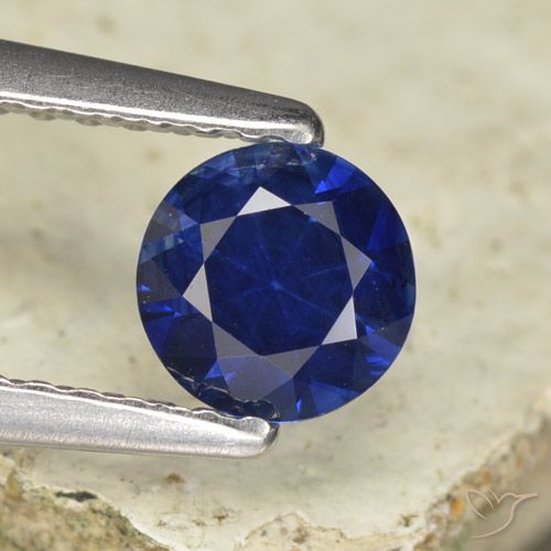 Zafiro Azul crepúsculo natural de 0.57 ct, Redondo, VVS-VS