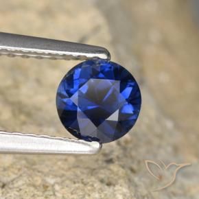 Zafiro Azul marino natural de 0.64 ct, Redondo, VVS