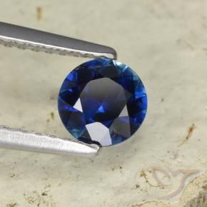 Zafiro Azul oscuro natural de 0.70 ct, Redondo, VVS-VS