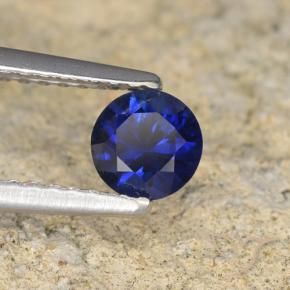 Zafiro Azul oscuro natural de 0.57 ct, Redondo, VVS-VS