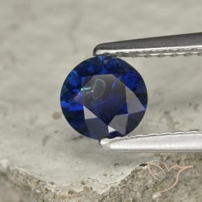 Zafiro Azul oscuro natural de 0.73 ct, Redondo, VS