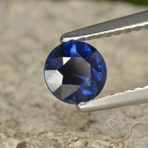 Zafiro Azul oscuro natural de 0.71 ct, Redondo, VVS