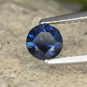 Zafiro Azul oscuro natural de 0.62 ct, Redondo, VVS