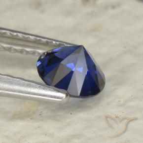 Zafiro Azul oscuro natural de 0.53 ct, Corte Redondo, VVS