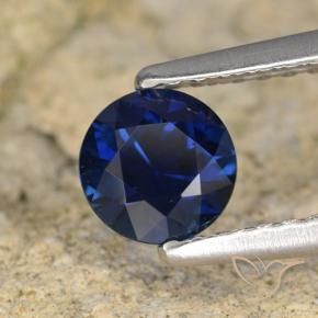 Zafiro Azul oscuro natural de 0.64 ct, Redondo, VVS-VS