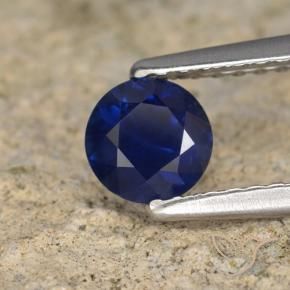 Zafiro Azul oscuro natural de 0.56 ct, Redondo, VVS