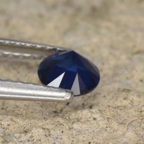 Zafiro Azul oscuro natural de 0.56 ct, Redondo, VVS